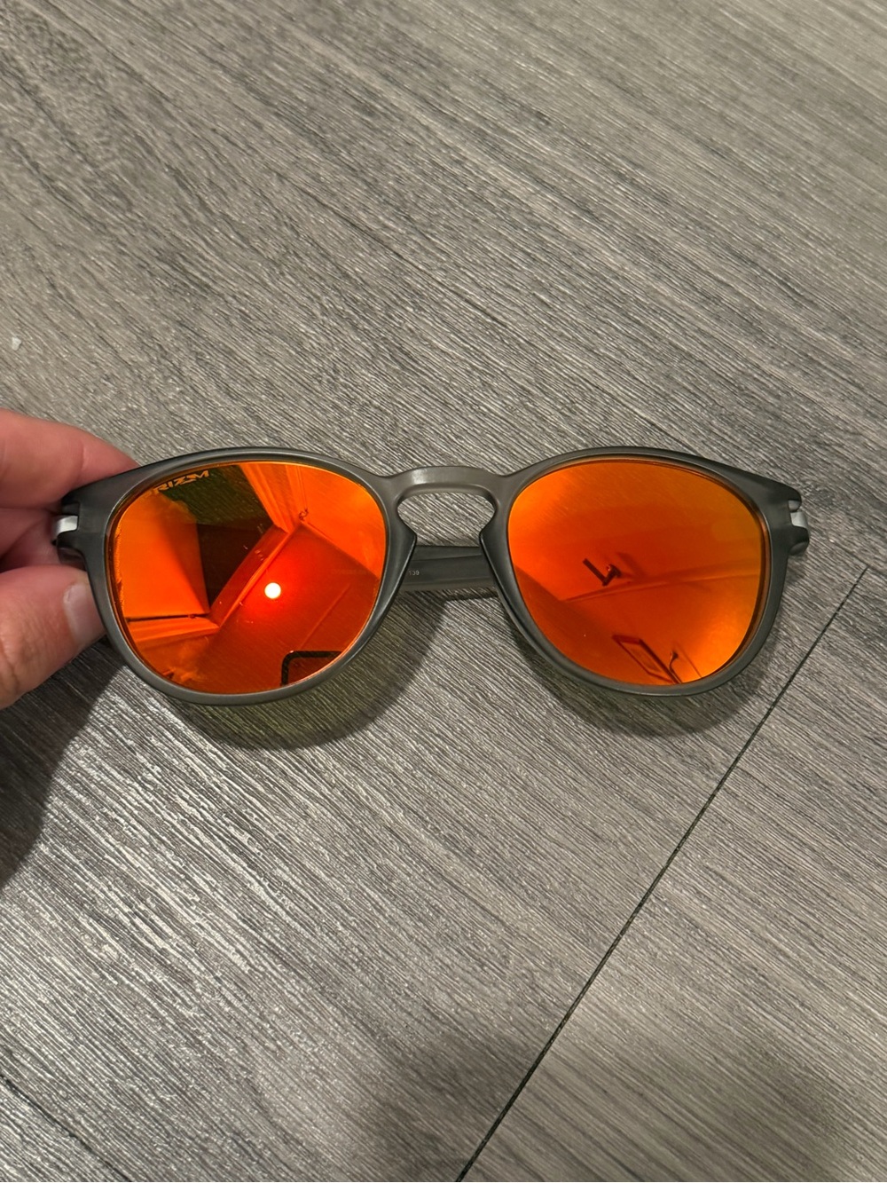 Oakley latch sunglasses 53 21 139 ruby prizm polarized lenses red orange gray